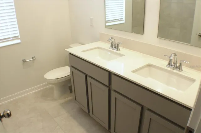 a bathroom with a sink and a toilet