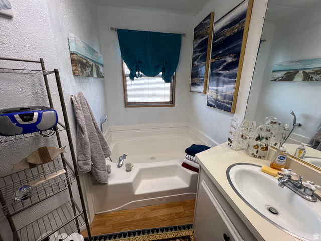 419 2nd E Street Helper, UT 84526 - Photo 20 of 36 Primary bathroom with separate tub and shower, double sinks