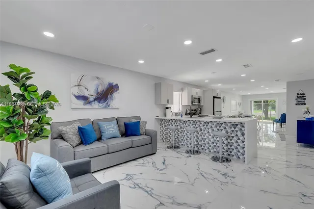 a living room with furniture and a couch