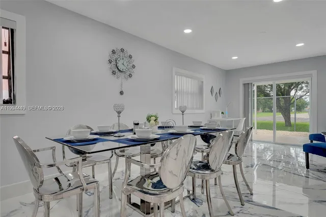 a table and chairs in a room