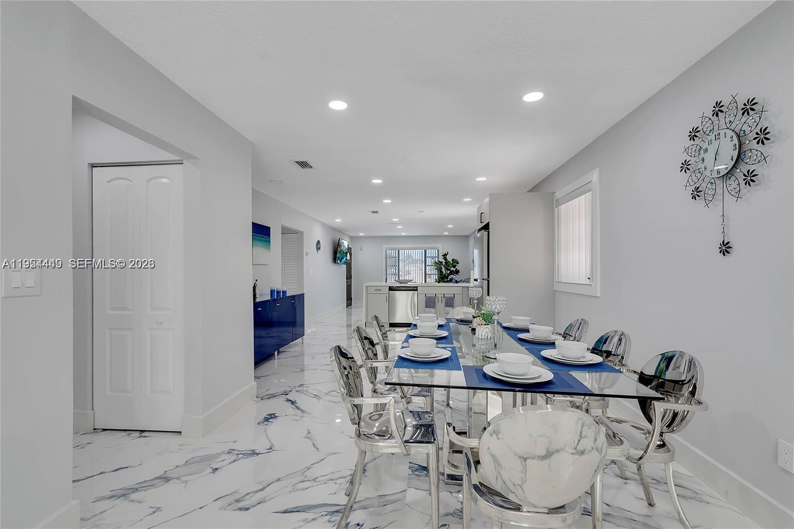 895 West 39th Place, Unit 1 Hialeah, FL 33012 - Photo 9 of 35 a view of a dining room with furniture