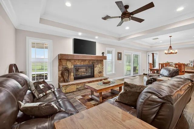 a bathroom with a tub and a window