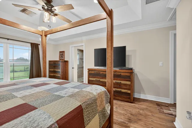 a bedroom with a bed and a dresser