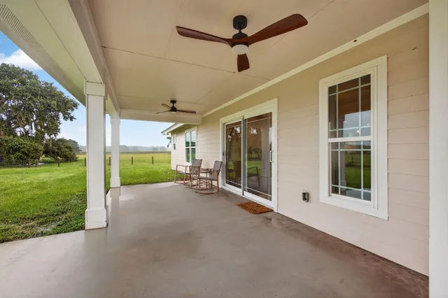 a view of a room with wooden walls