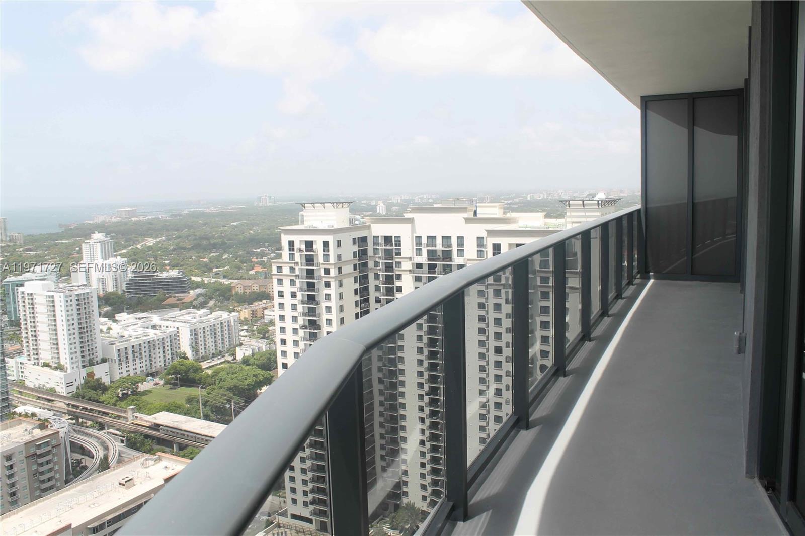 45 Southwest 9th Street, Unit 3703 Miami, FL 33130 - Photo 48 of 73 a balcony with city view