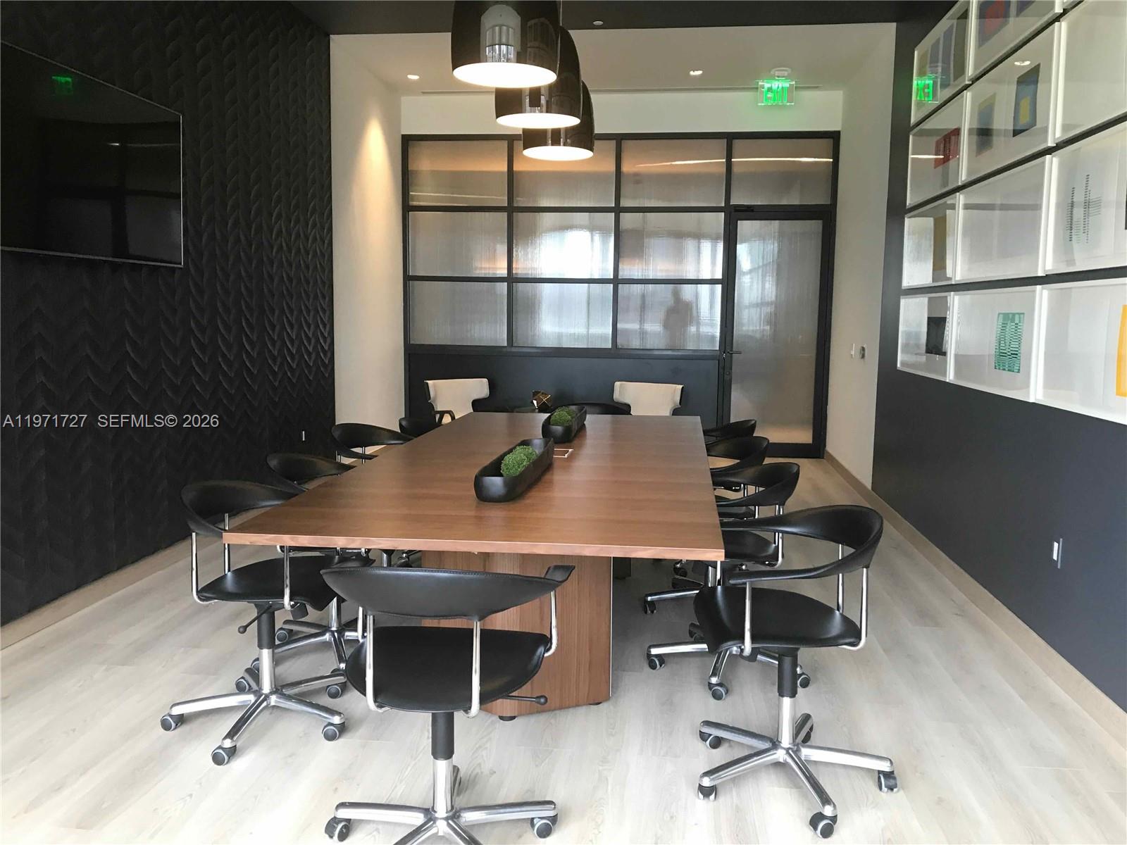 45 Southwest 9th Street, Unit 3703 Miami, FL 33130 - Photo 58 of 73 a view of a workspace with furniture