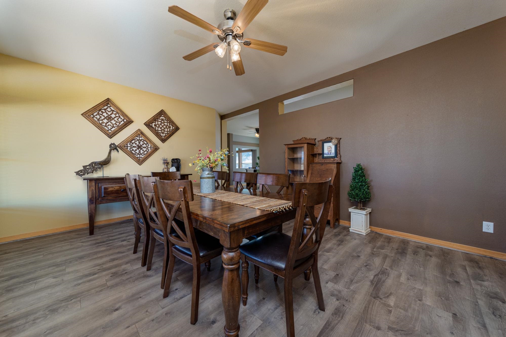 1745 North 3/10 Road Fruita, CO 81521 - Photo 12 of 41 a view of a dining room with furniture