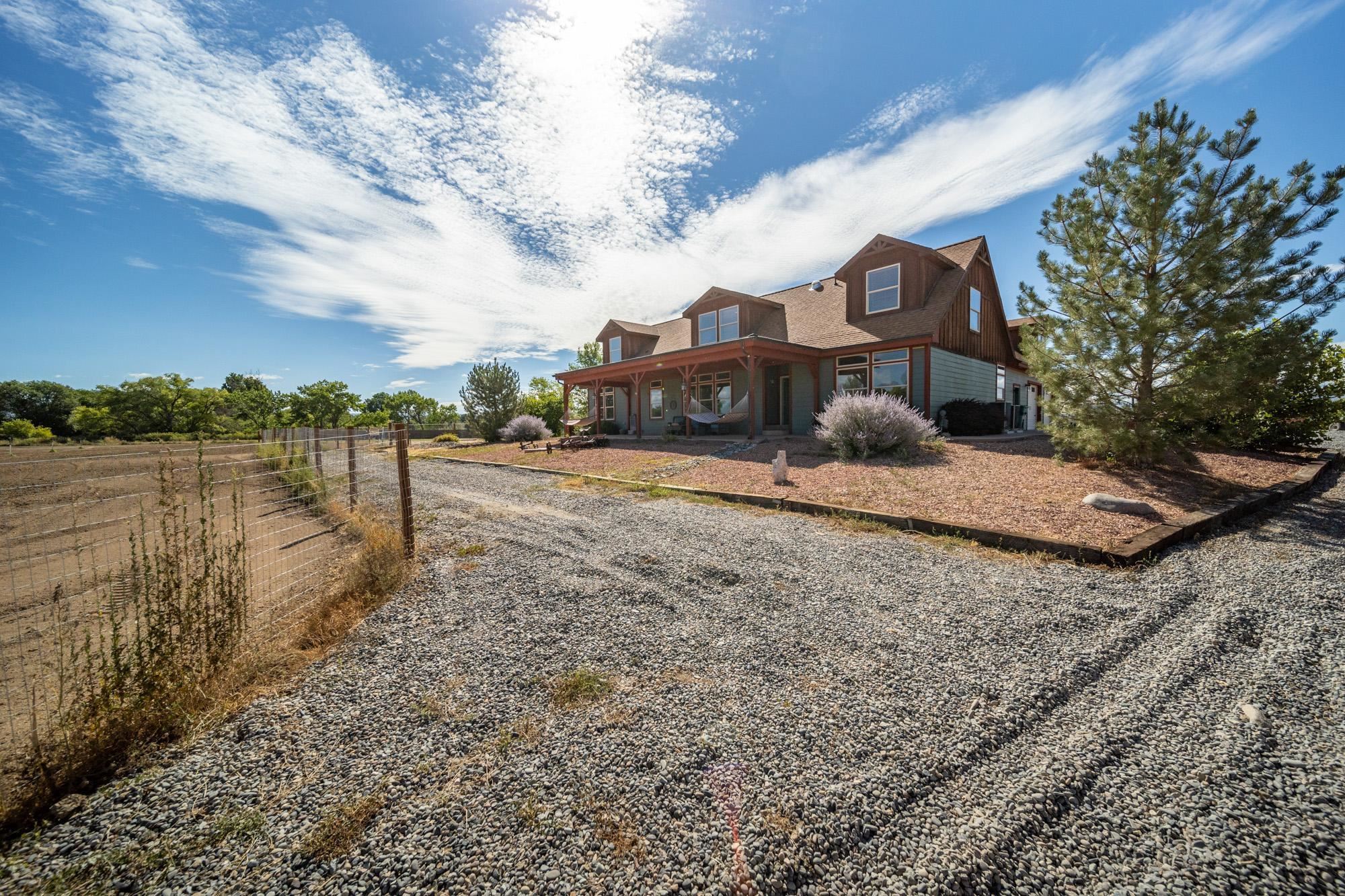 1745 North 3/10 Road Fruita, CO 81521 - Photo 2 of 41 a city view with a lake view