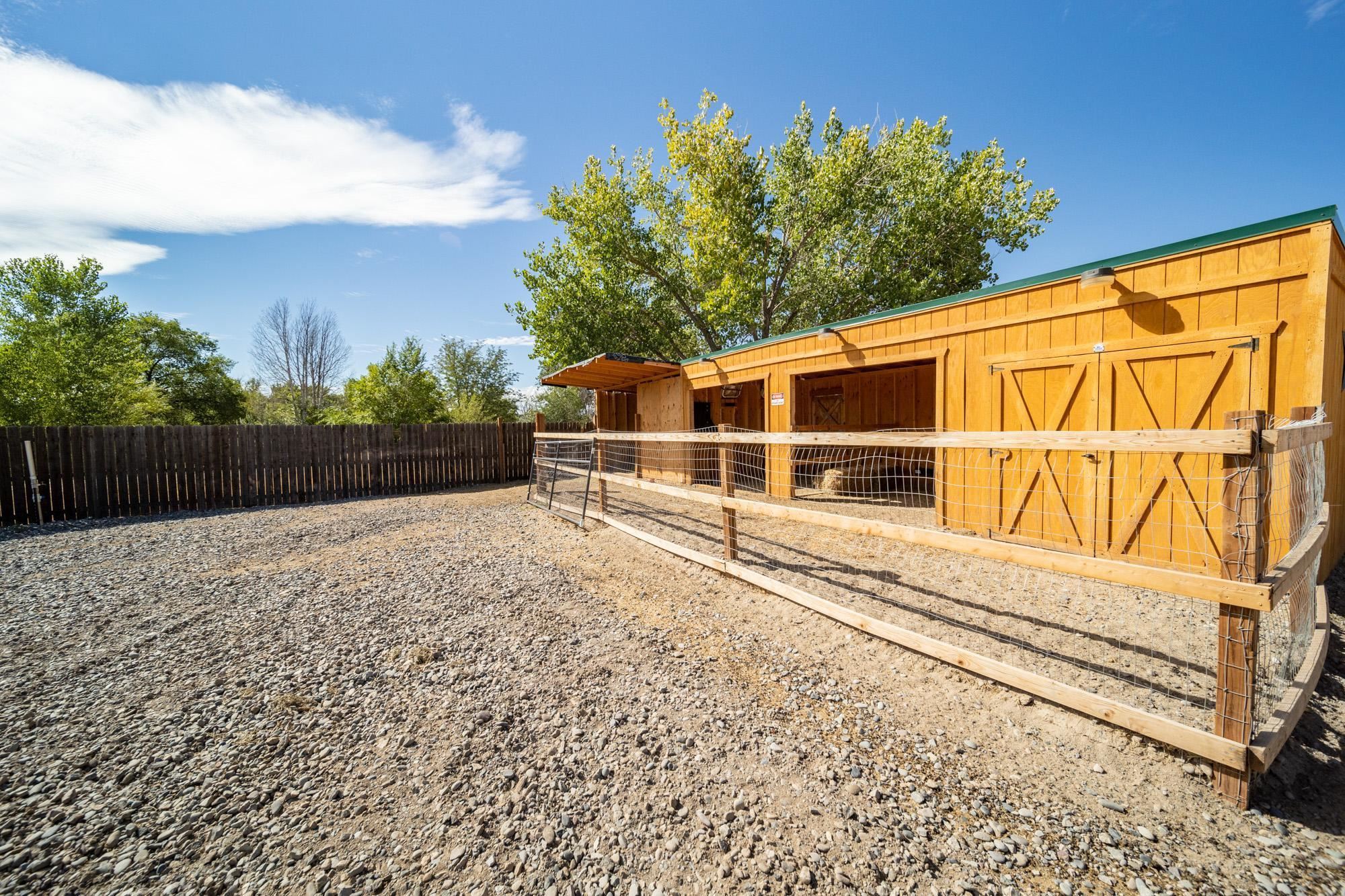 1745 North 3/10 Road Fruita, CO 81521 - Photo 38 of 41 a view of a house with a backyard