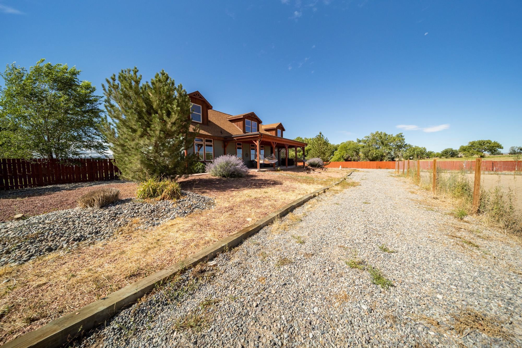 1745 North 3/10 Road Fruita, CO 81521 - Photo 40 of 41 a view of a lake with a mountain in the back