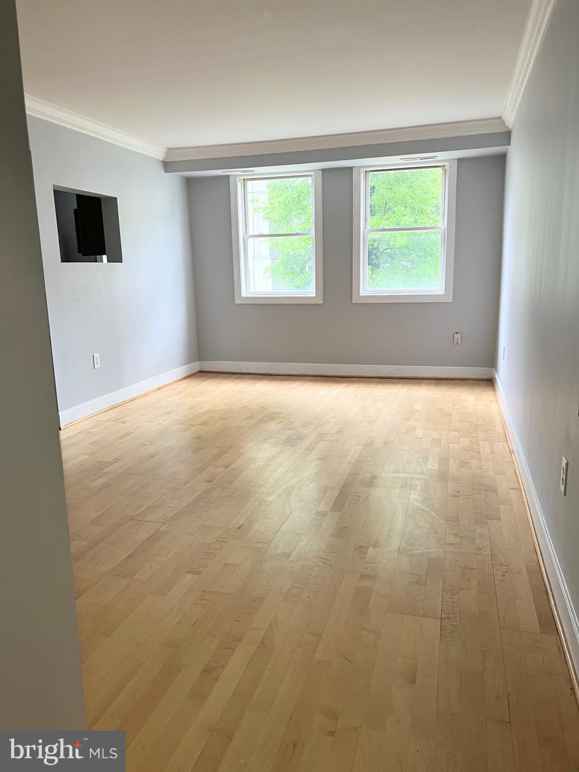 2841 Gainesville Street Southeast, Unit 203 Washington, DC 20020 - Photo 11 of 12 a view of an empty room with a window