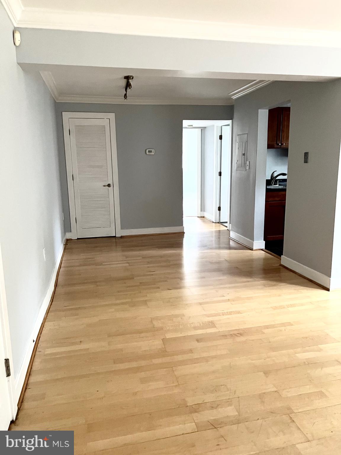 2841 Gainesville Street Southeast, Unit 203 Washington, DC 20020 - Photo 10 of 12 a view of an empty room with closet and entryway