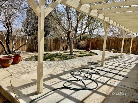 1304 South McCall Street Ridgecrest, CA 93555 - Photo 18 of 22 a view of a backyard of the house