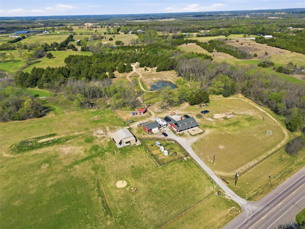 3823 State Highway Bonham, TX 75418 - Photo 2 of 37 a view of a swimming pool with a mountain
