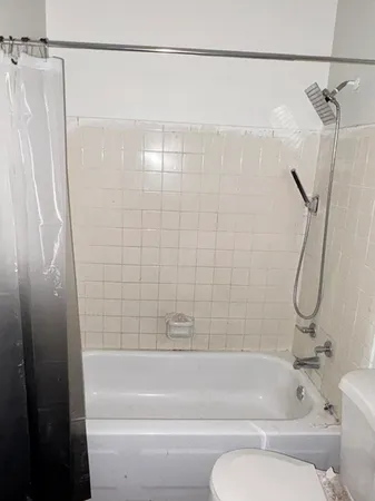 a close view of a sink and dishwasher in a kitchen