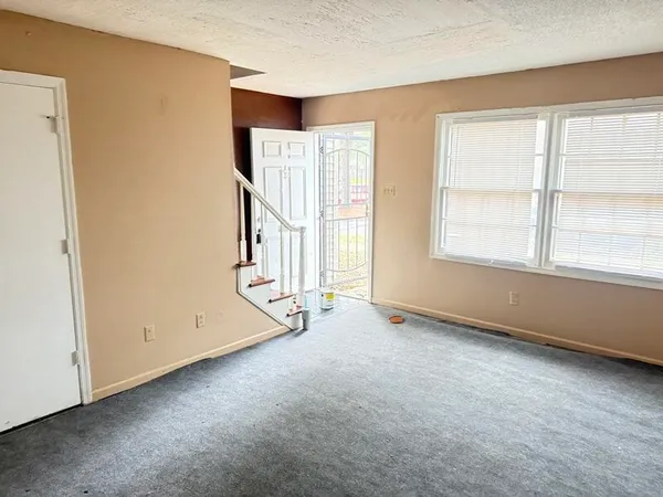 an empty room with windows