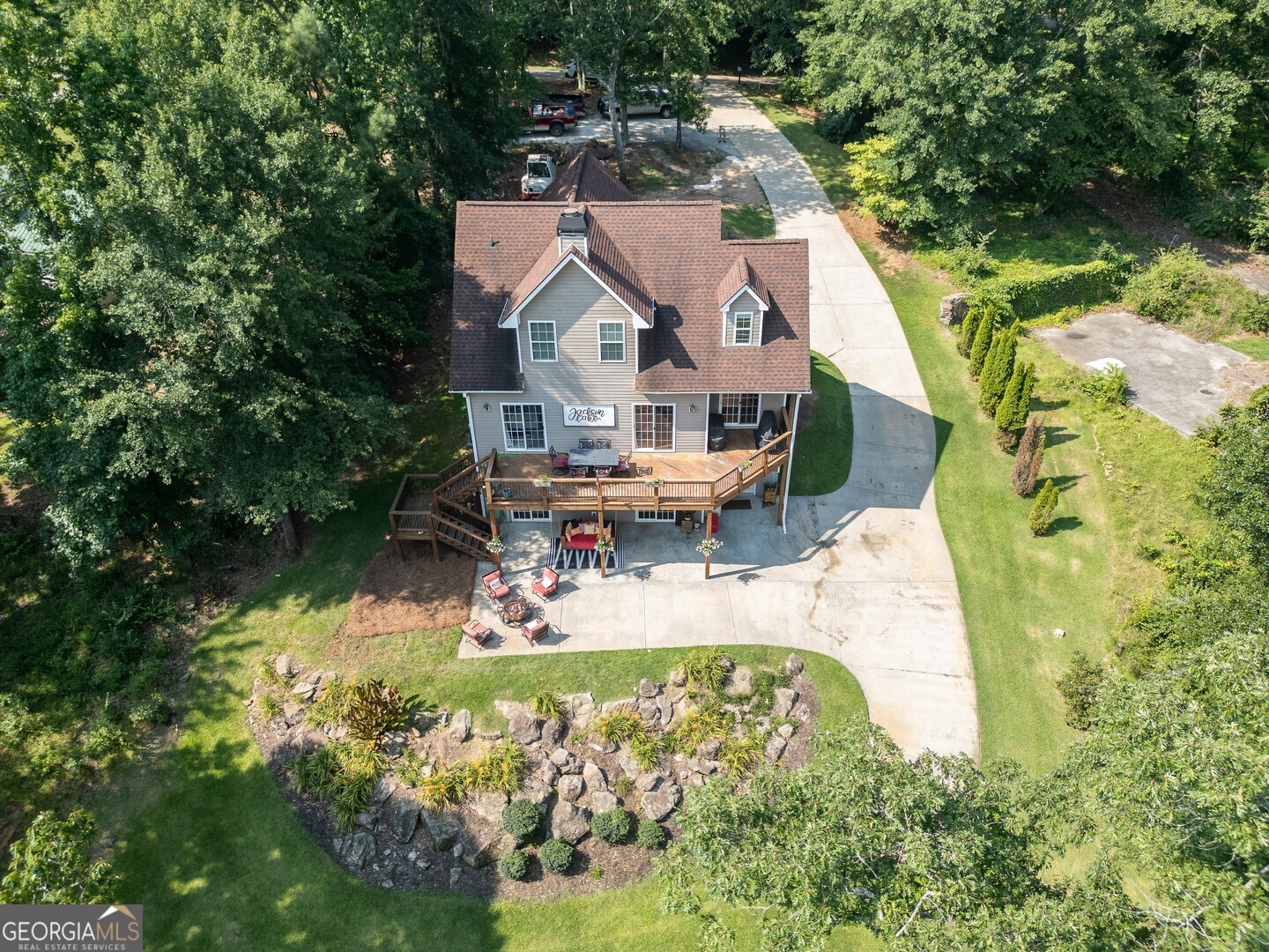 734 Raven Road Monticello, GA 31064 - Photo 13 of 81 an aerial view of a house with swimming pool and garden