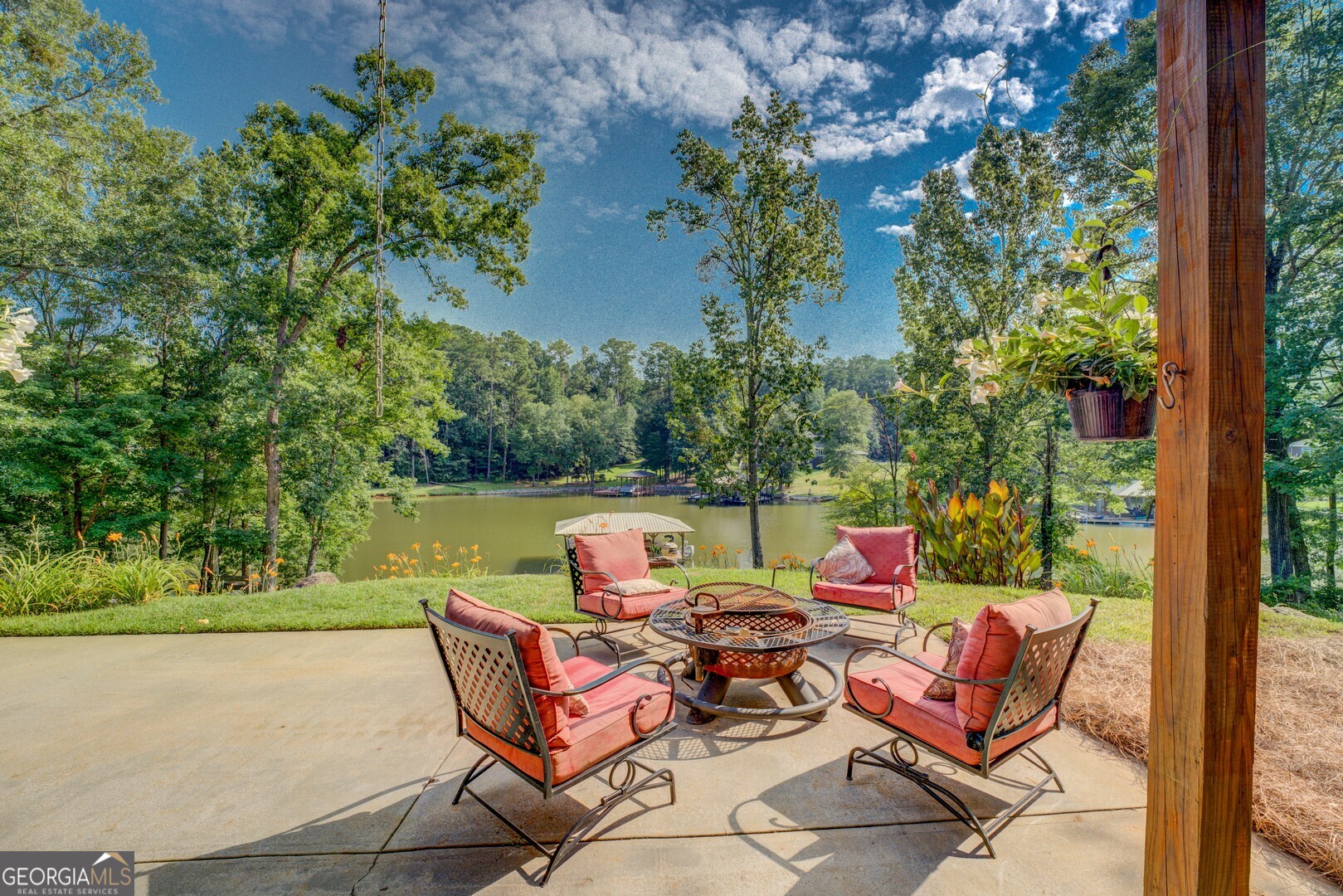 734 Raven Road Monticello, GA 31064 - Photo 22 of 81 an outdoor sitting area with furniture and garden