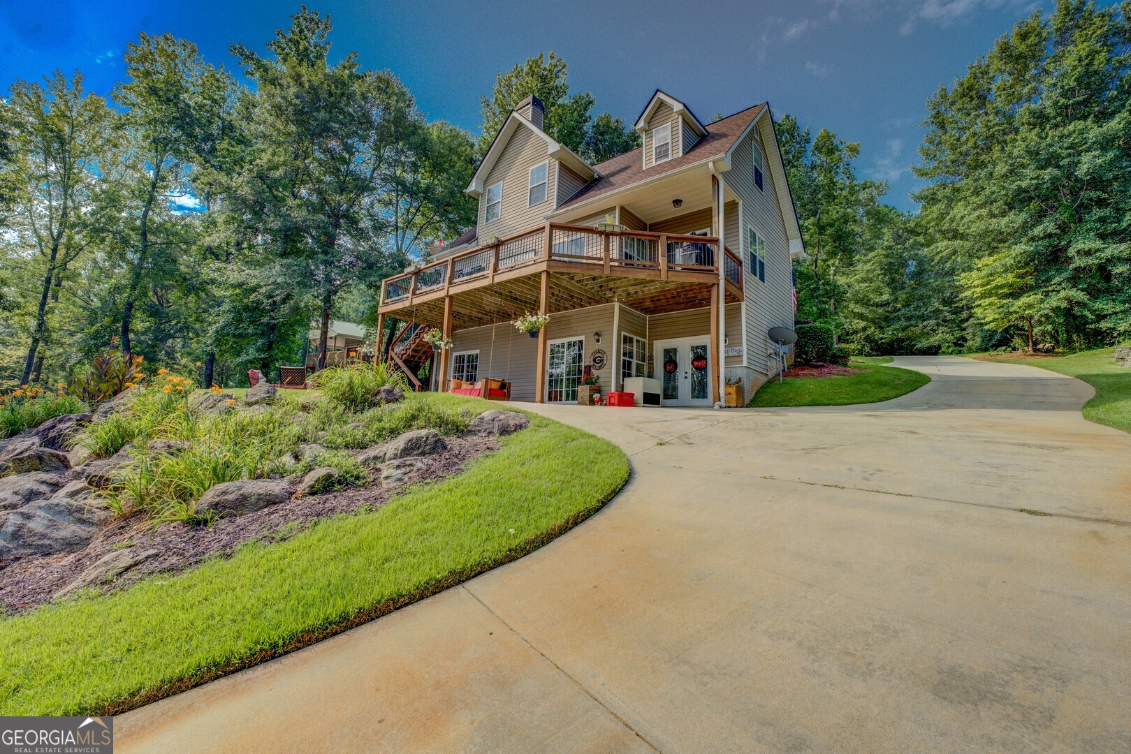 734 Raven Road Monticello, GA 31064 - Photo 23 of 81 a view of a house with a yard and potted plants