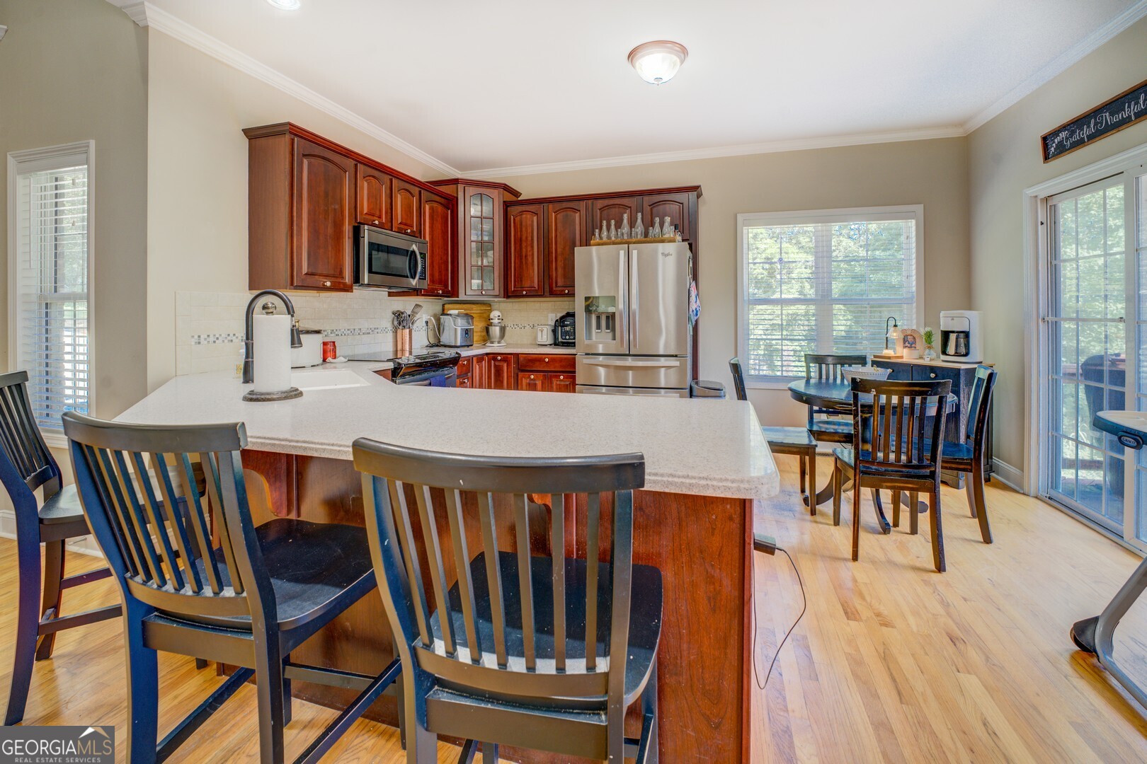 734 Raven Road Monticello, GA 31064 - Photo 35 of 81 a view of a dining room with furniture window and outside view