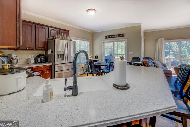 a bed room with a bed and a flat screen tv