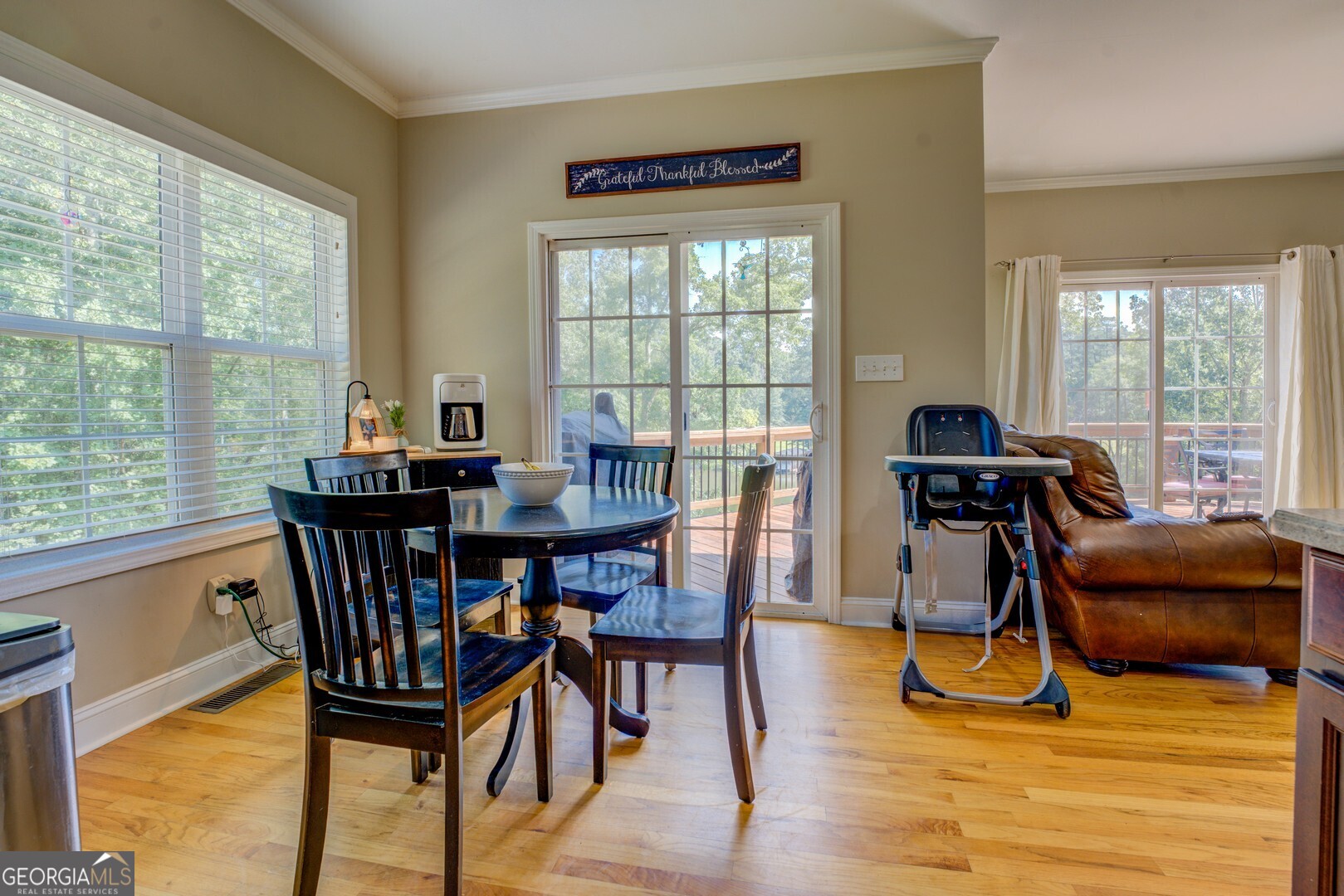 734 Raven Road Monticello, GA 31064 - Photo 38 of 81 a view of a dining room with furniture window and outside view