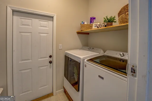a bathroom with a shower and a toilet