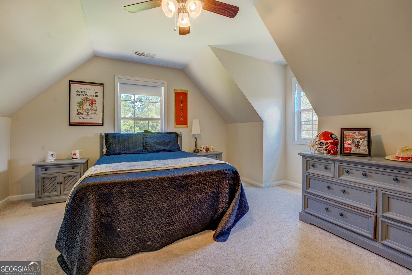 734 Raven Road Monticello, GA 31064 - Photo 56 of 81 a bedroom with a bed and a dresser