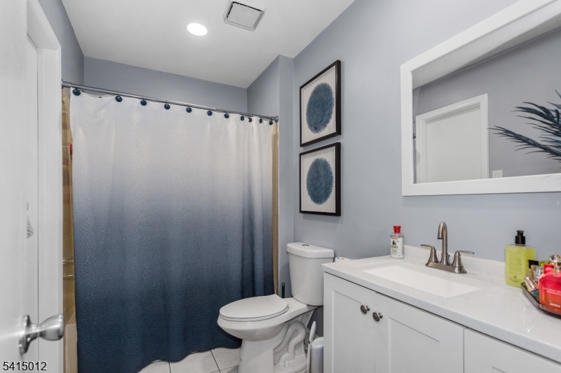 40 Bennington Square Hackettstown, NJ 07840 - Photo 20 of 23 a bathroom with a sink toilet and a mirror