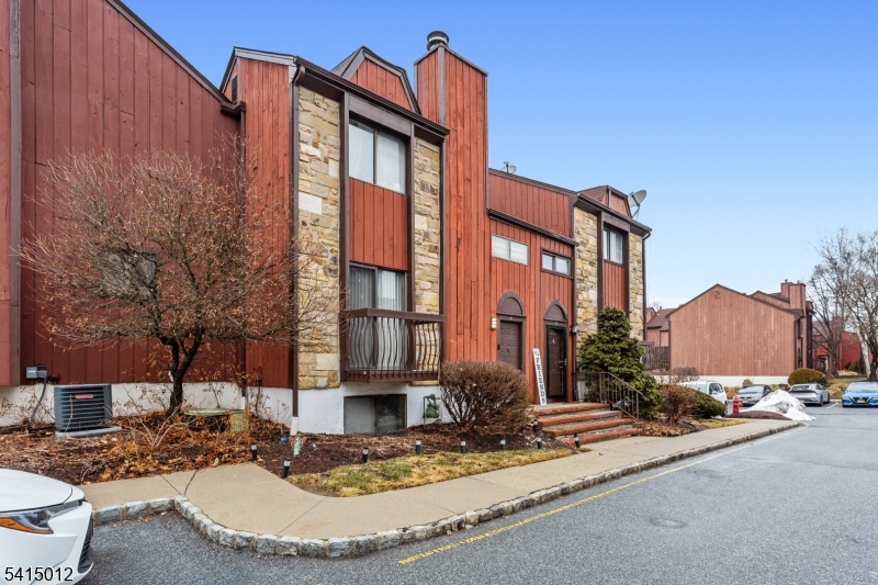 40 Bennington Square Hackettstown, NJ 07840 - Photo 2 of 23 a view of a building with a yard