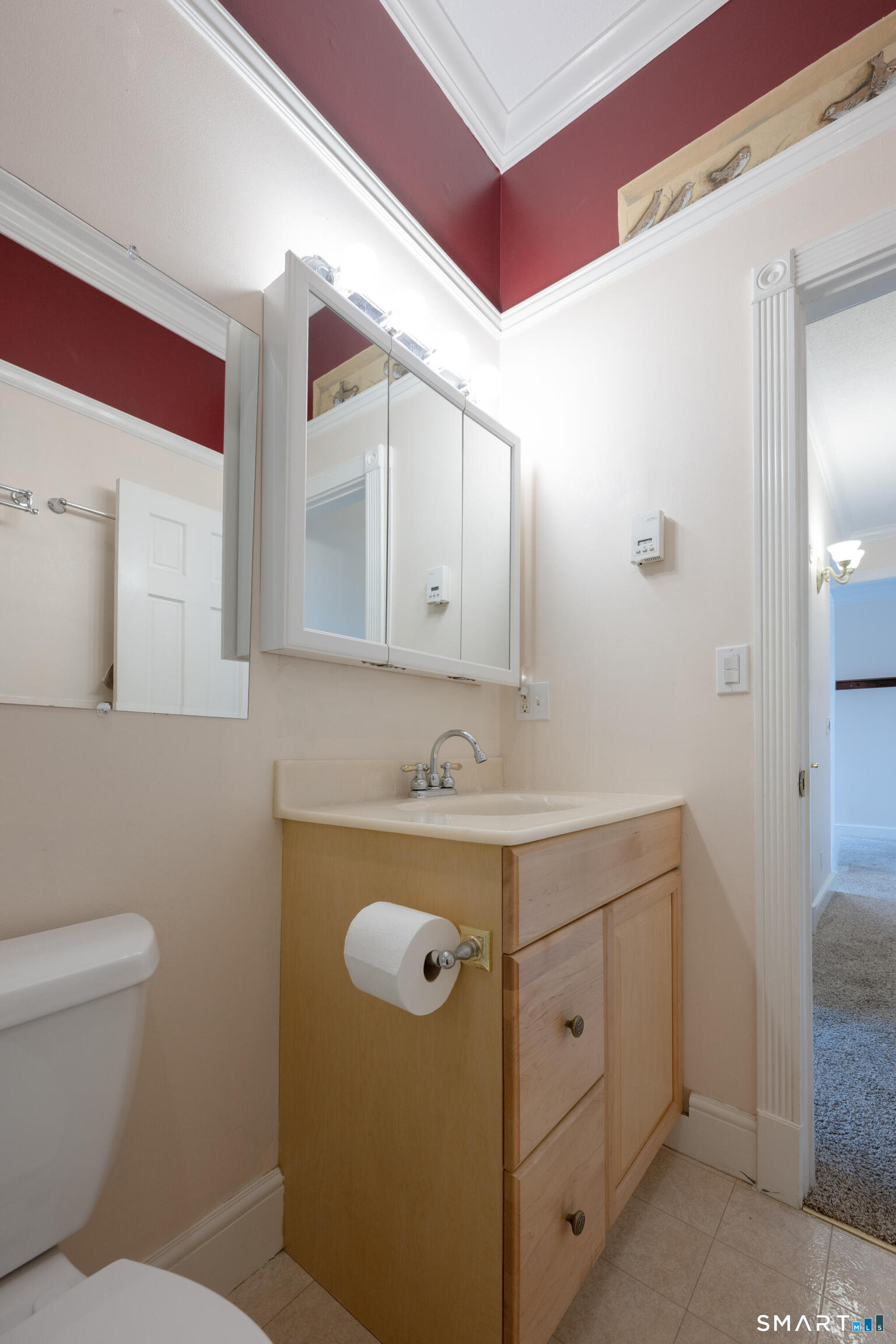 130 Main Street, Unit 2D Canton, CT 06019 - Photo 17 of 25 a bathroom with a sink a toilet and mirror