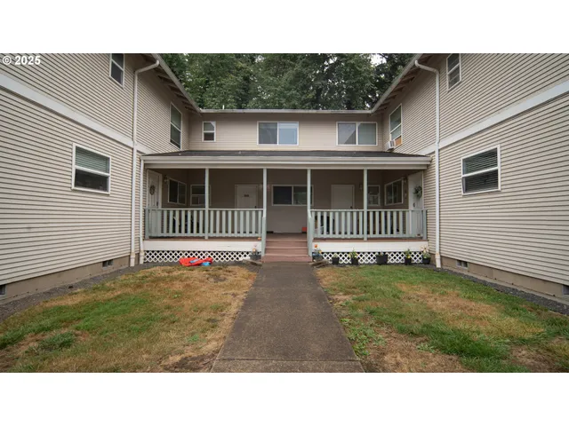 a black and white photo of a house