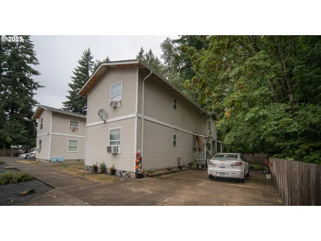 a black and white photo of a house