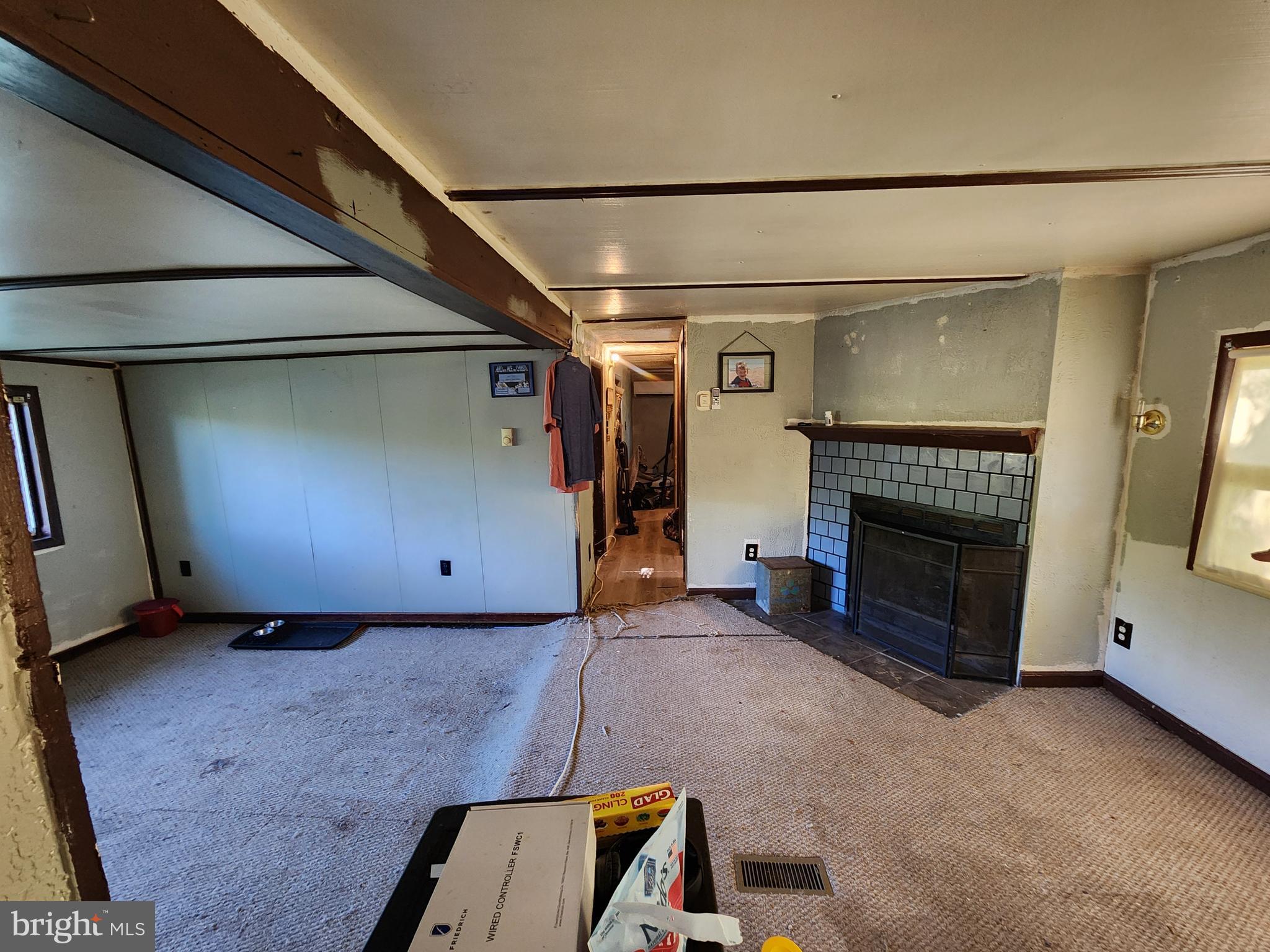 2616 Old Elk Neck Road Elkton, MD 21921 - Photo 5 of 25 a view of an empty room with fire place and a fireplace