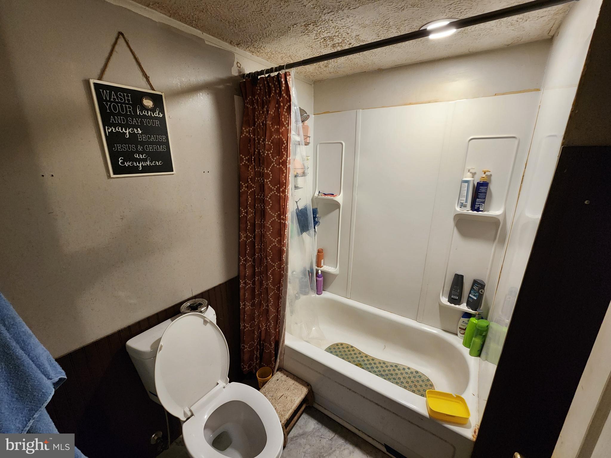 2616 Old Elk Neck Road Elkton, MD 21921 - Photo 10 of 25 a bathroom with a toilet and a shower