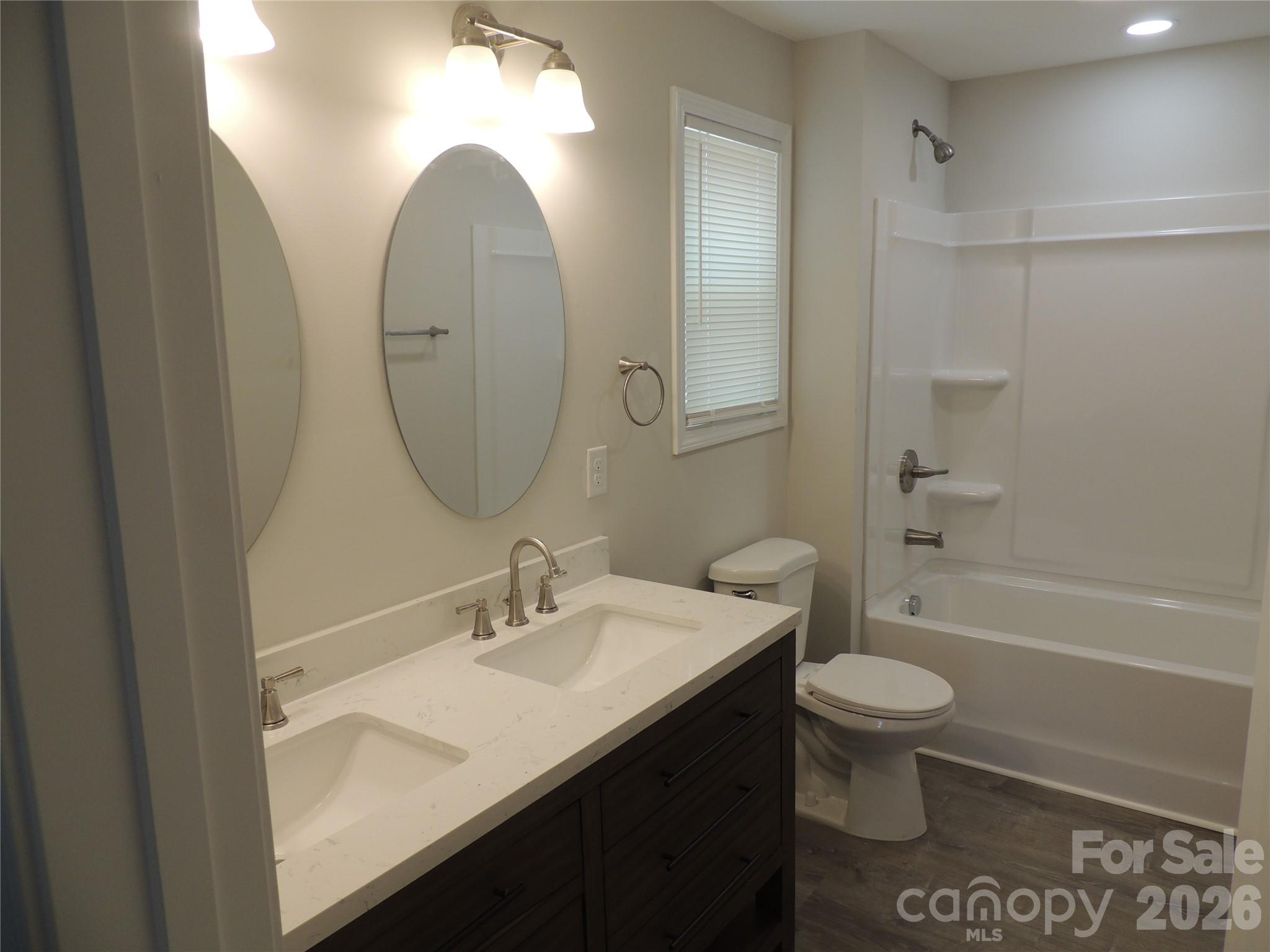 146 Loomis Street Chester, SC 29706 - Photo 11 of 12 a bathroom with a sink toilet and shower