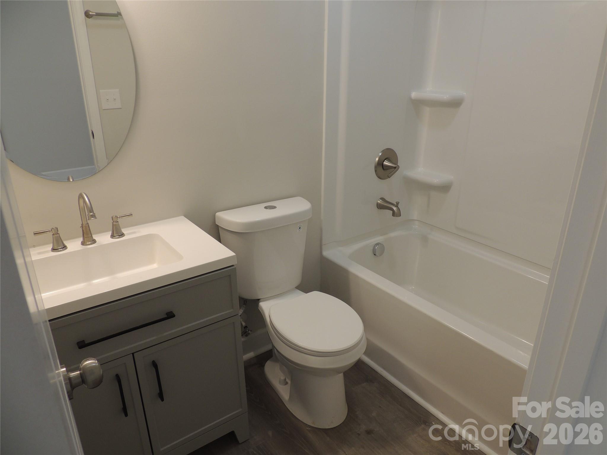 146 Loomis Street Chester, SC 29706 - Photo 7 of 12 a bathroom with a sink toilet and bathtub