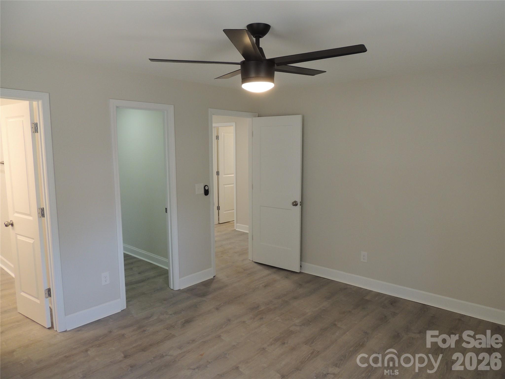 146 Loomis Street Chester, SC 29706 - Photo 10 of 12 an empty room to ceiling fan and closet area