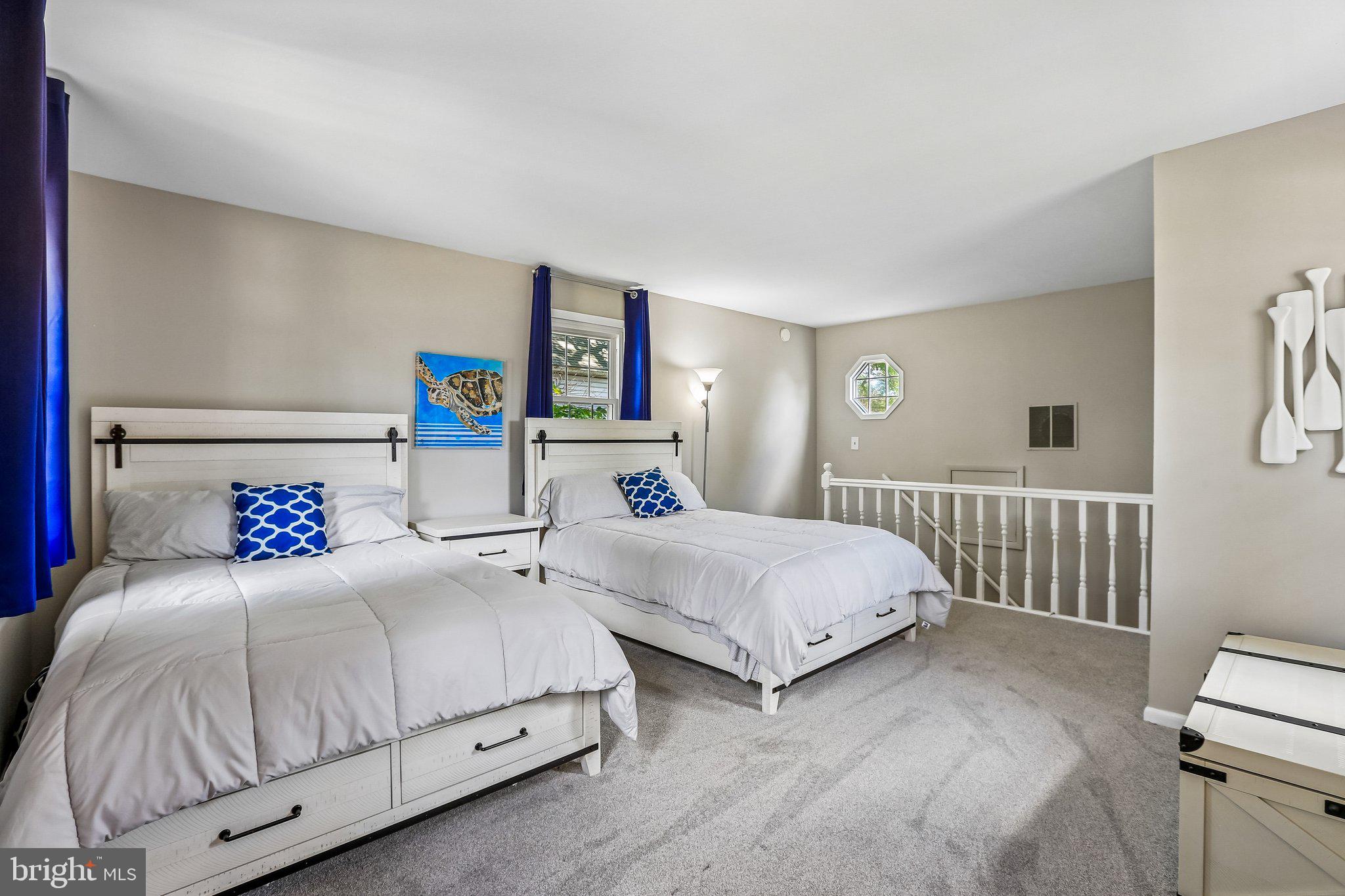 275 Gibson Road Pasadena, MD 21122 - Photo 23 of 59 Bright and inviting dual bedroom retreat.