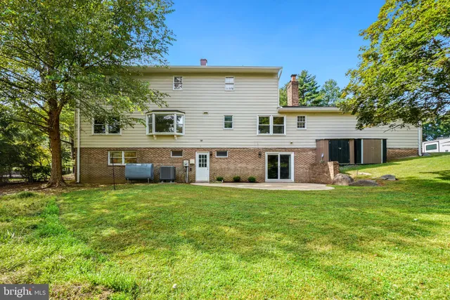 a view of a house with a big yard
