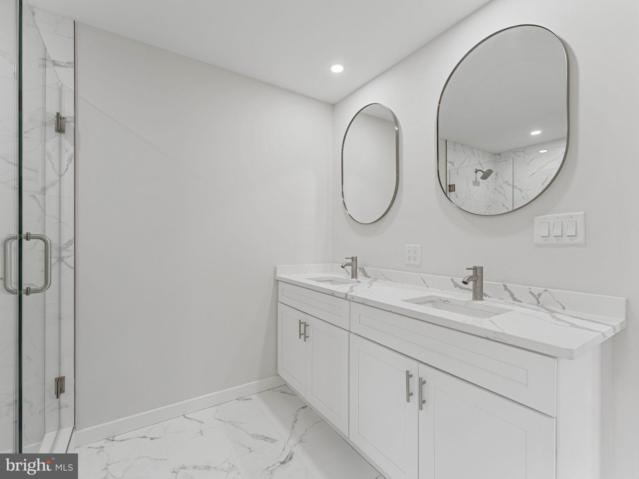 423 Almonesson Road Blackwood, NJ 08012 - Photo 25 of 40 Sleek modern bathroom with elegance.
