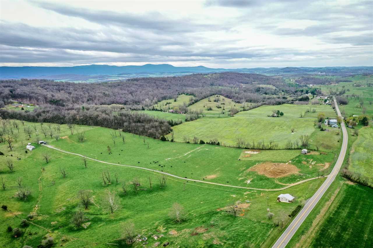 1122 Senedo Road New Market, VA 22844 - Photo 22 of 30 an aerial view of a golf course with a big yard