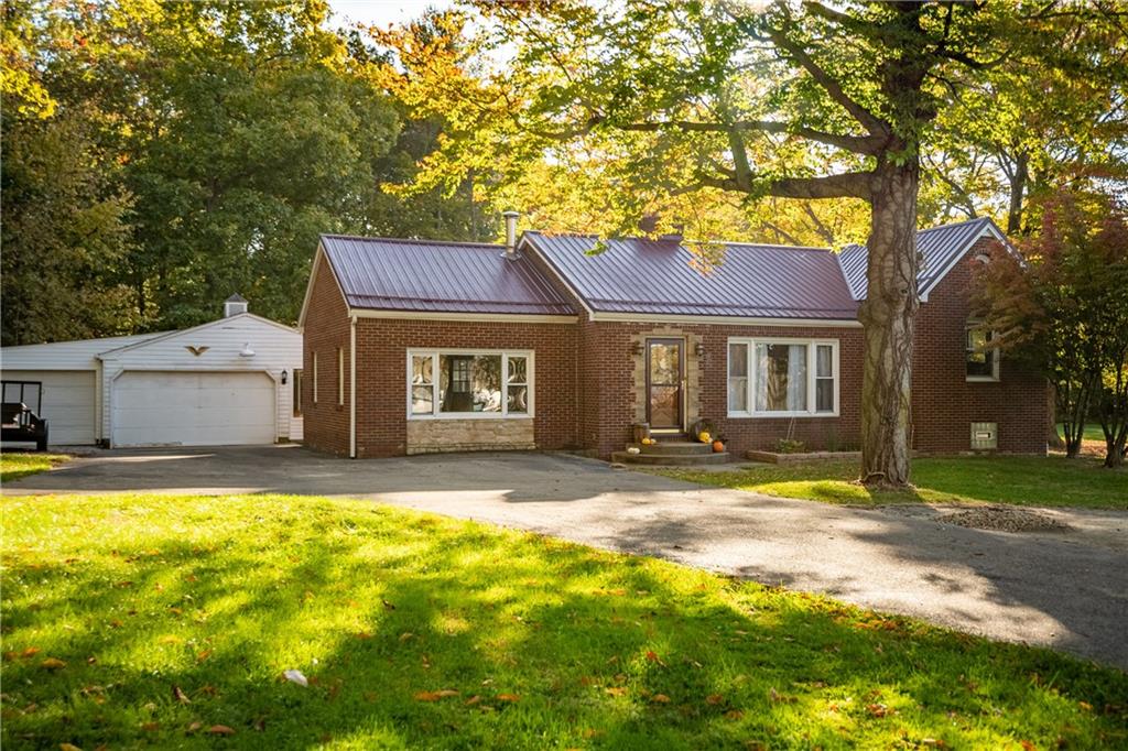 625 Stateline Road Bessemer, PA 16112 - Photo 1 of 19 a view of a house with a yard and tree s