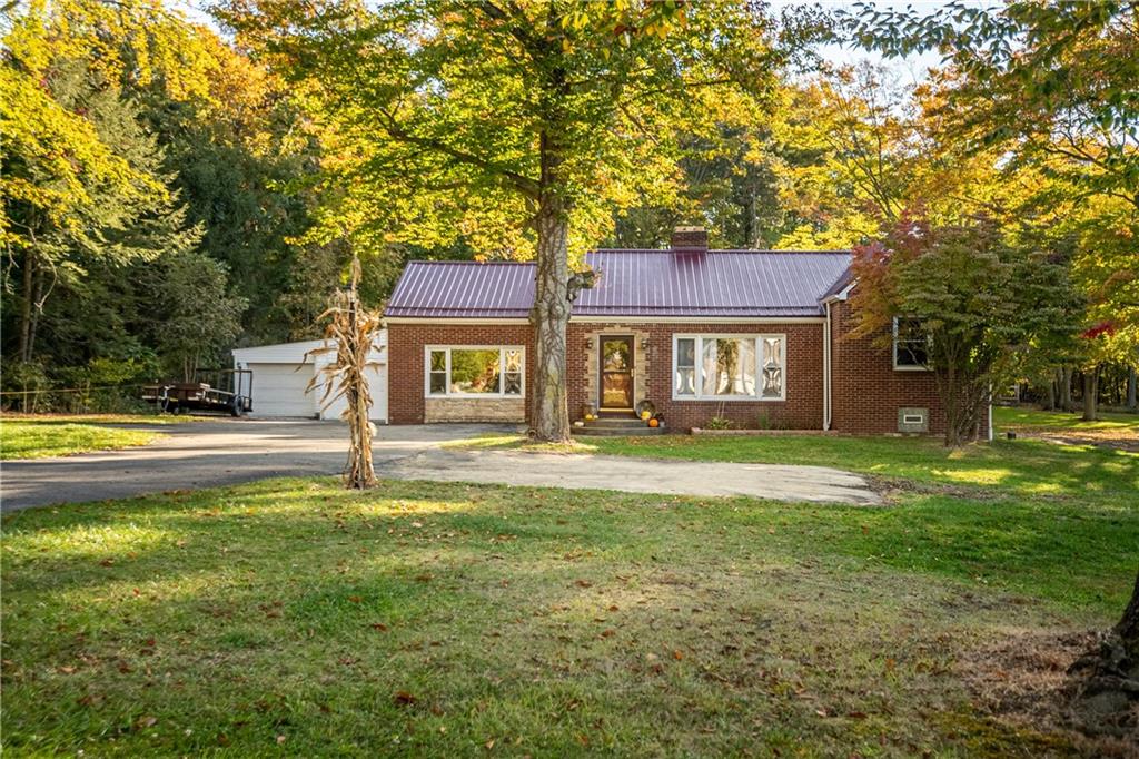 625 Stateline Road Bessemer, PA 16112 - Photo 19 of 19 a house view with swimming pool in front of it