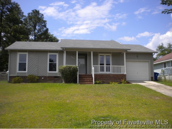 3327 Arrowhead Road Spring Lake, NC 28390 - Photo 1 of 17 a view of a house with a patio