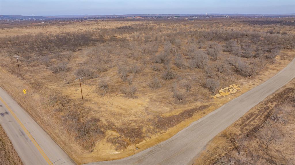 166 Fm 601 Albany, TX 76430 - Photo 3 of 8 a view of a dry yard with a wooden fence