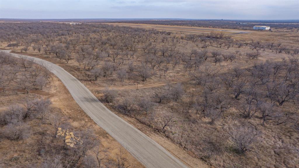 166 Fm 601 Albany, TX 76430 - Photo 4 of 8 a view of a dry yard with wooden floor and fence