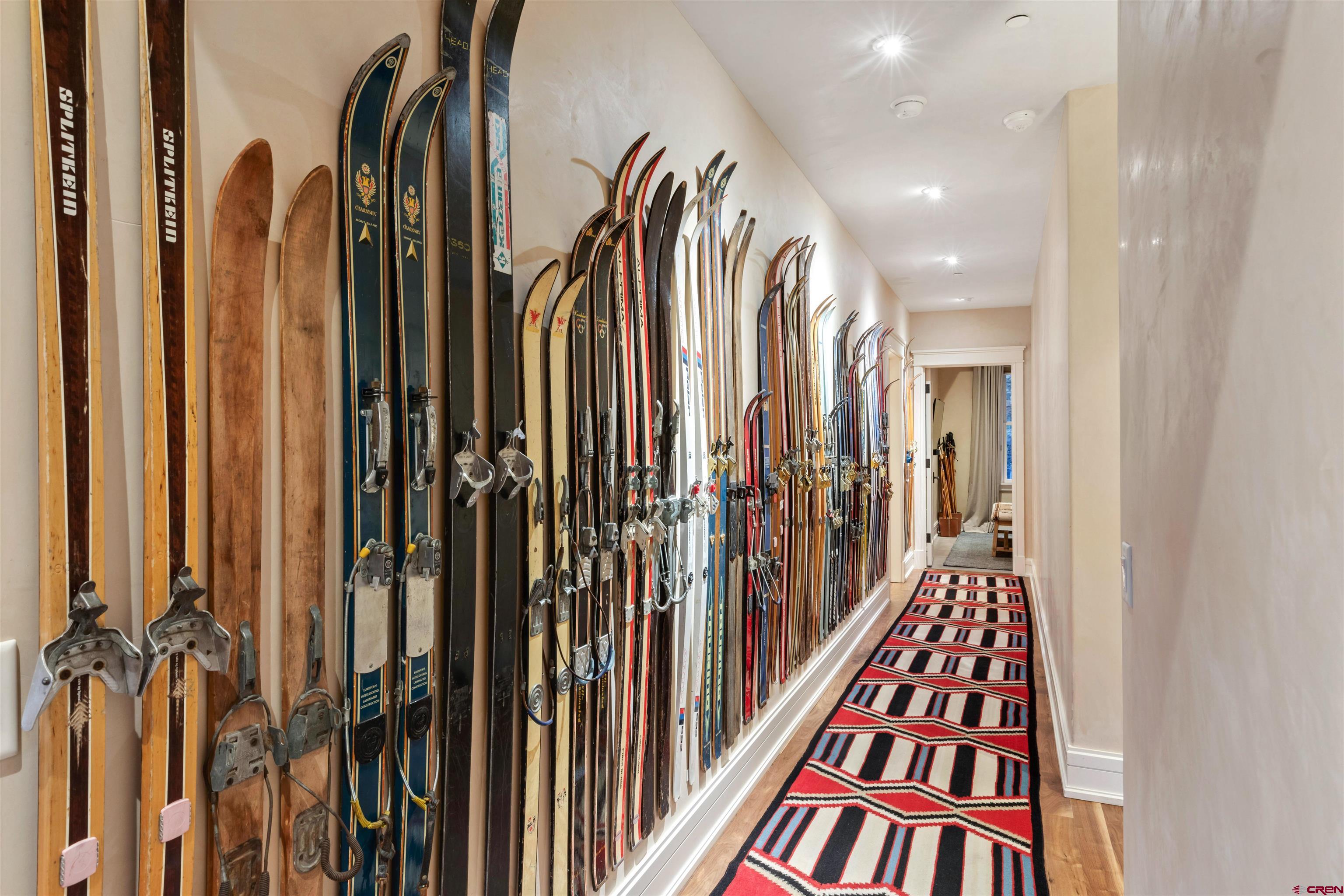 398 South Davis Street, Unit SW 201 Telluride, CO 81435 - Photo 12 of 23 a view of a hallway with wooden floor and stairs