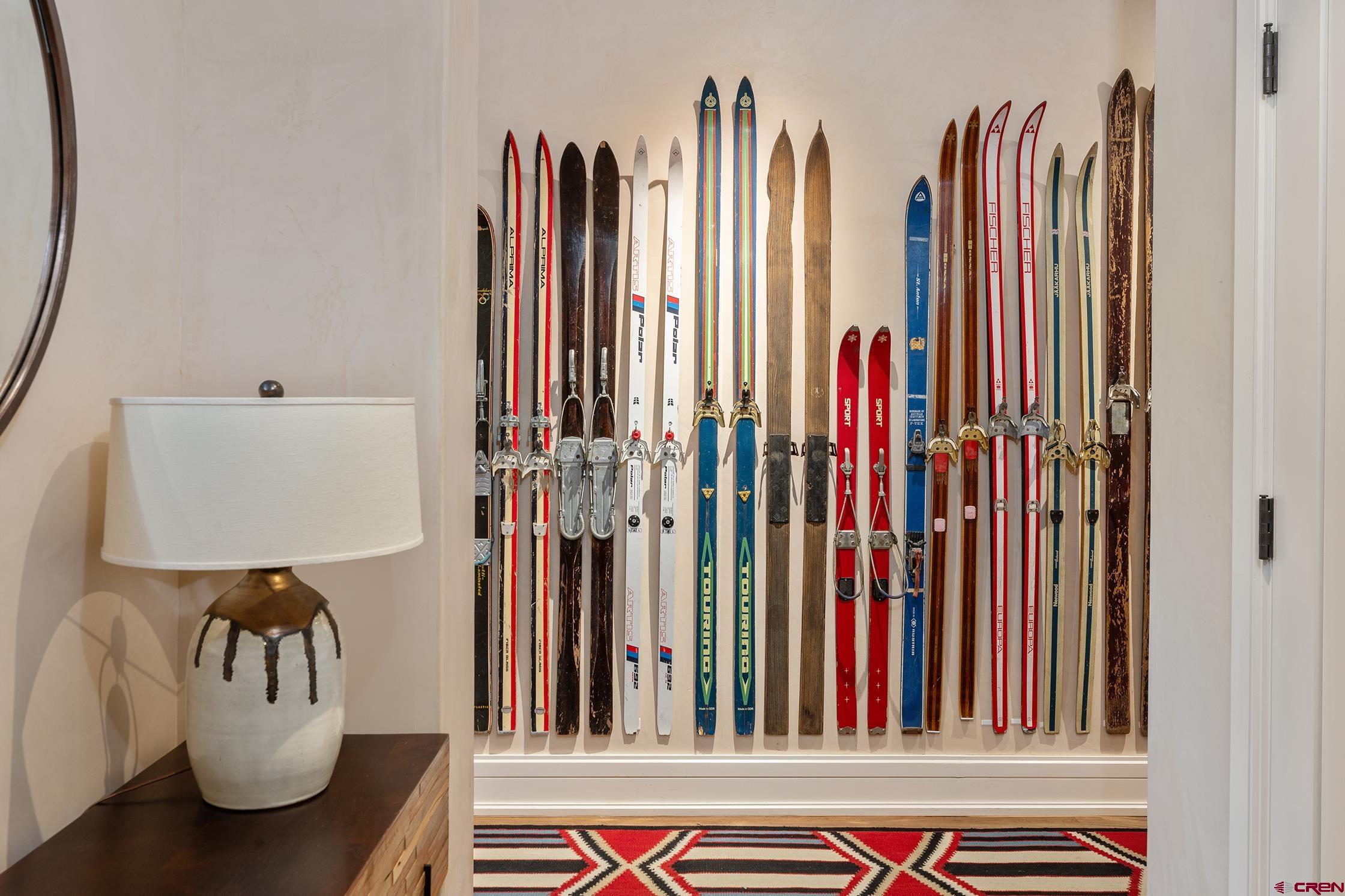 398 South Davis Street, Unit SW 201 Telluride, CO 81435 - Photo 14 of 23 a view of walk in closet with clothes and wooden floor