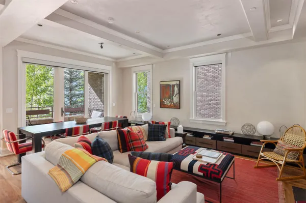 a living room with furniture and a window